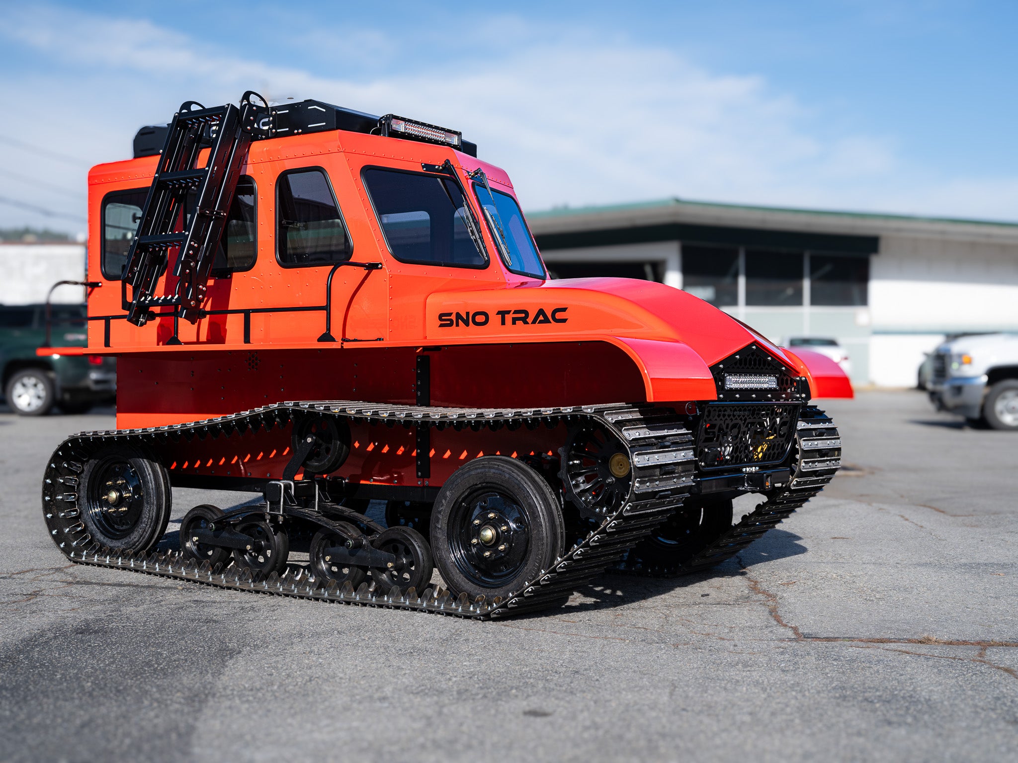 Sno Trac with roof rack and ladder