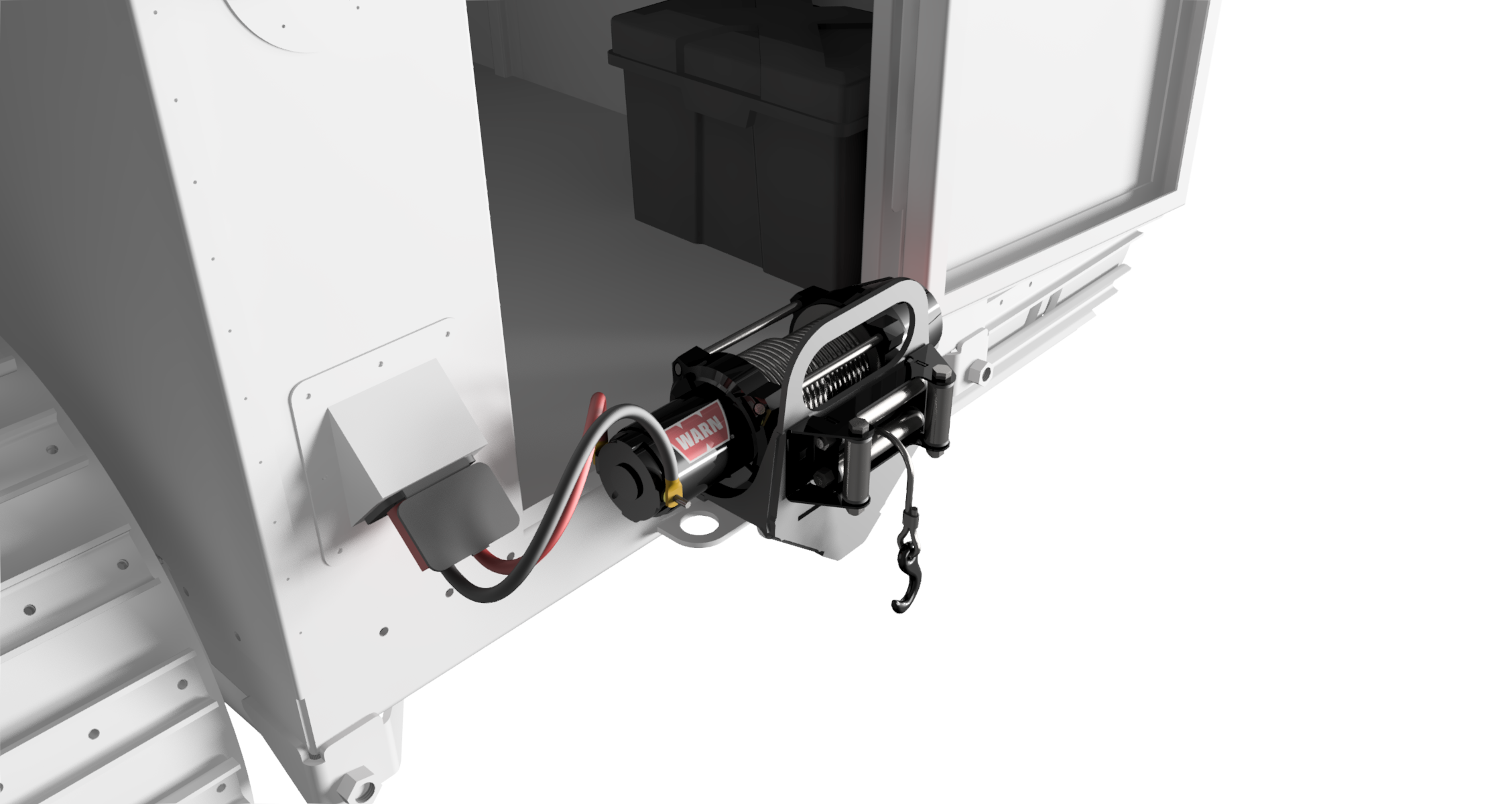 Close-up of a winch mounted on a back of Sno Trac