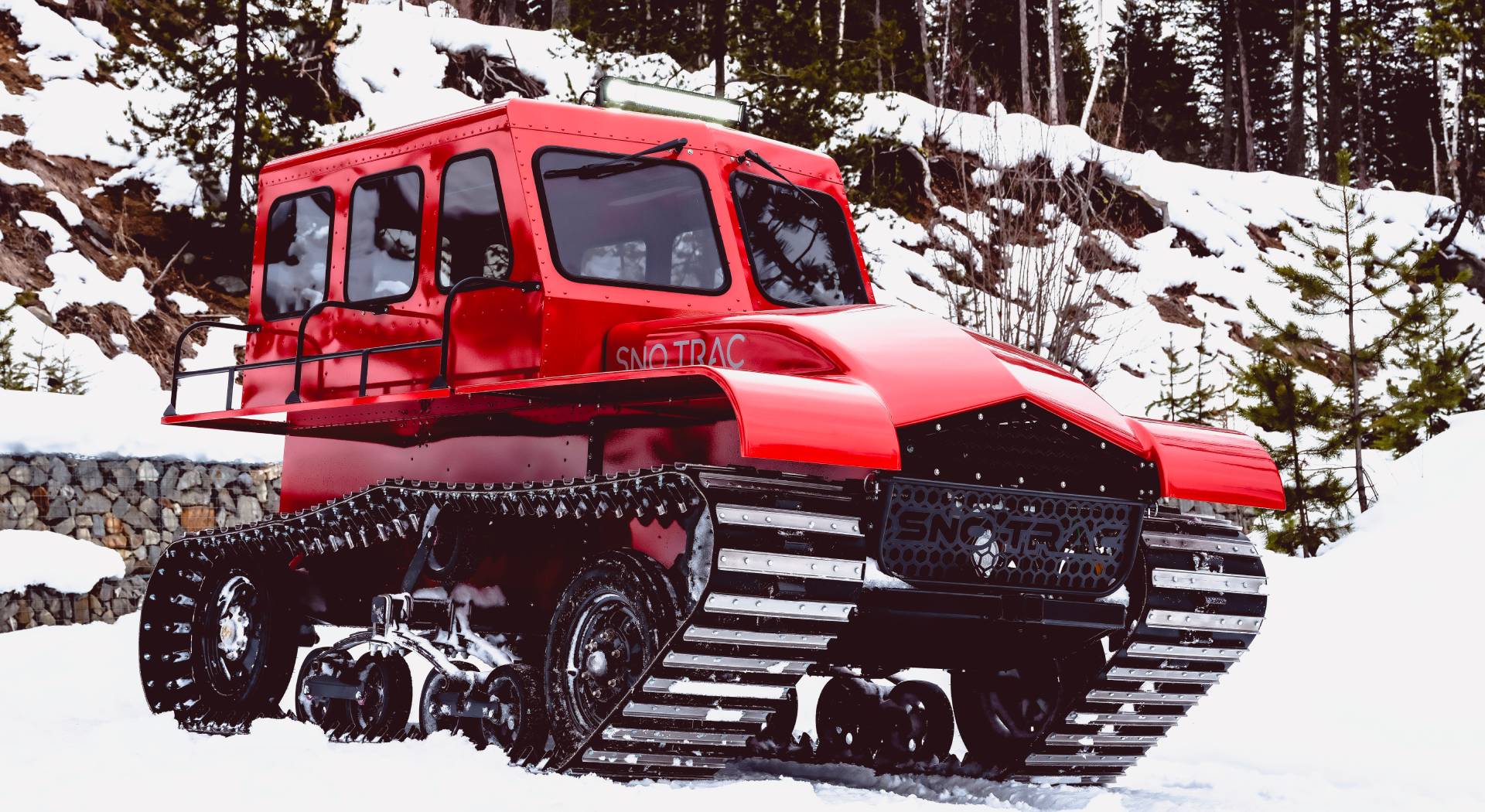 Red Sno Trac on snowy terrain