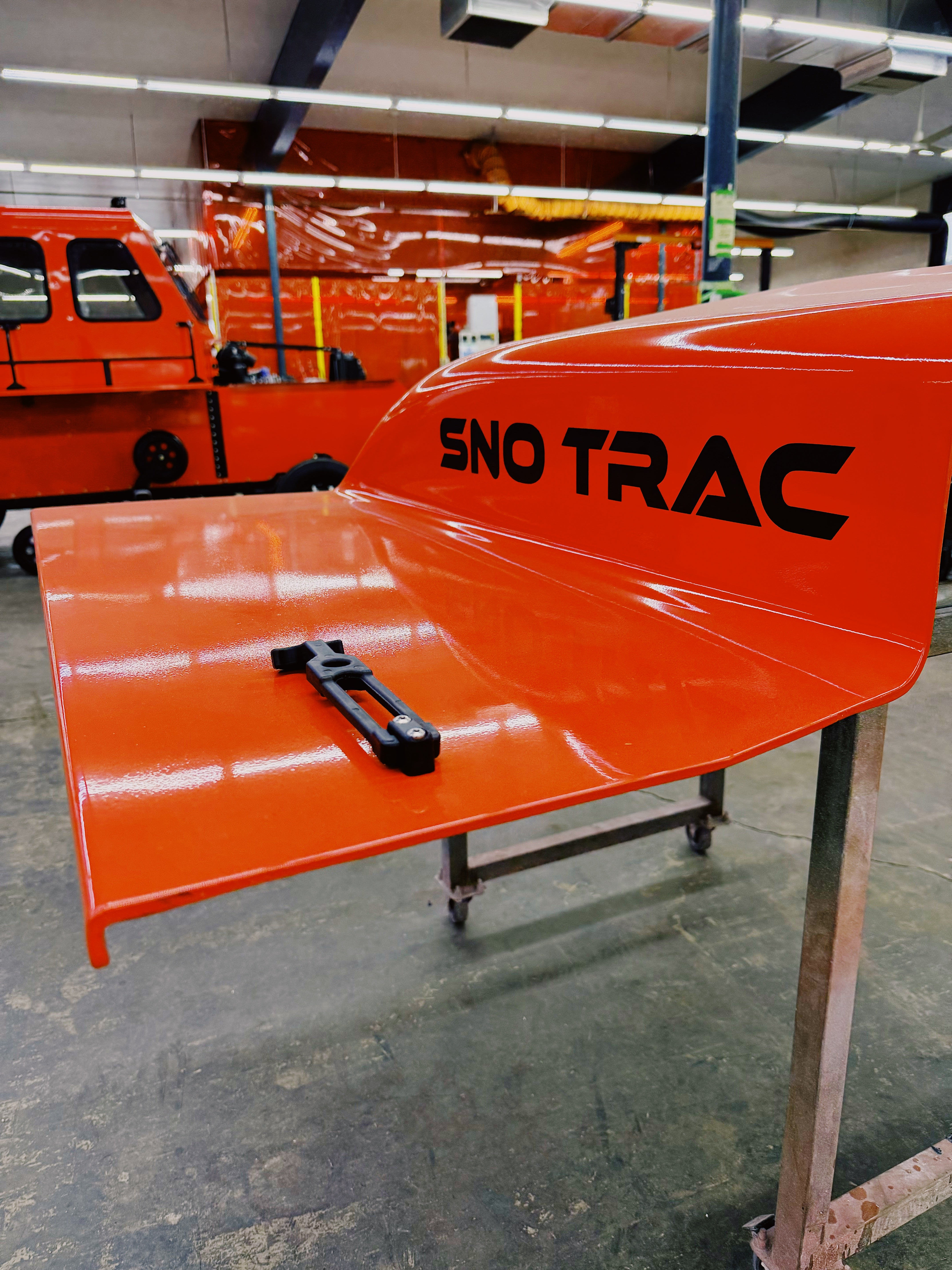 Sno Trac logo emblazened on vehicle hood