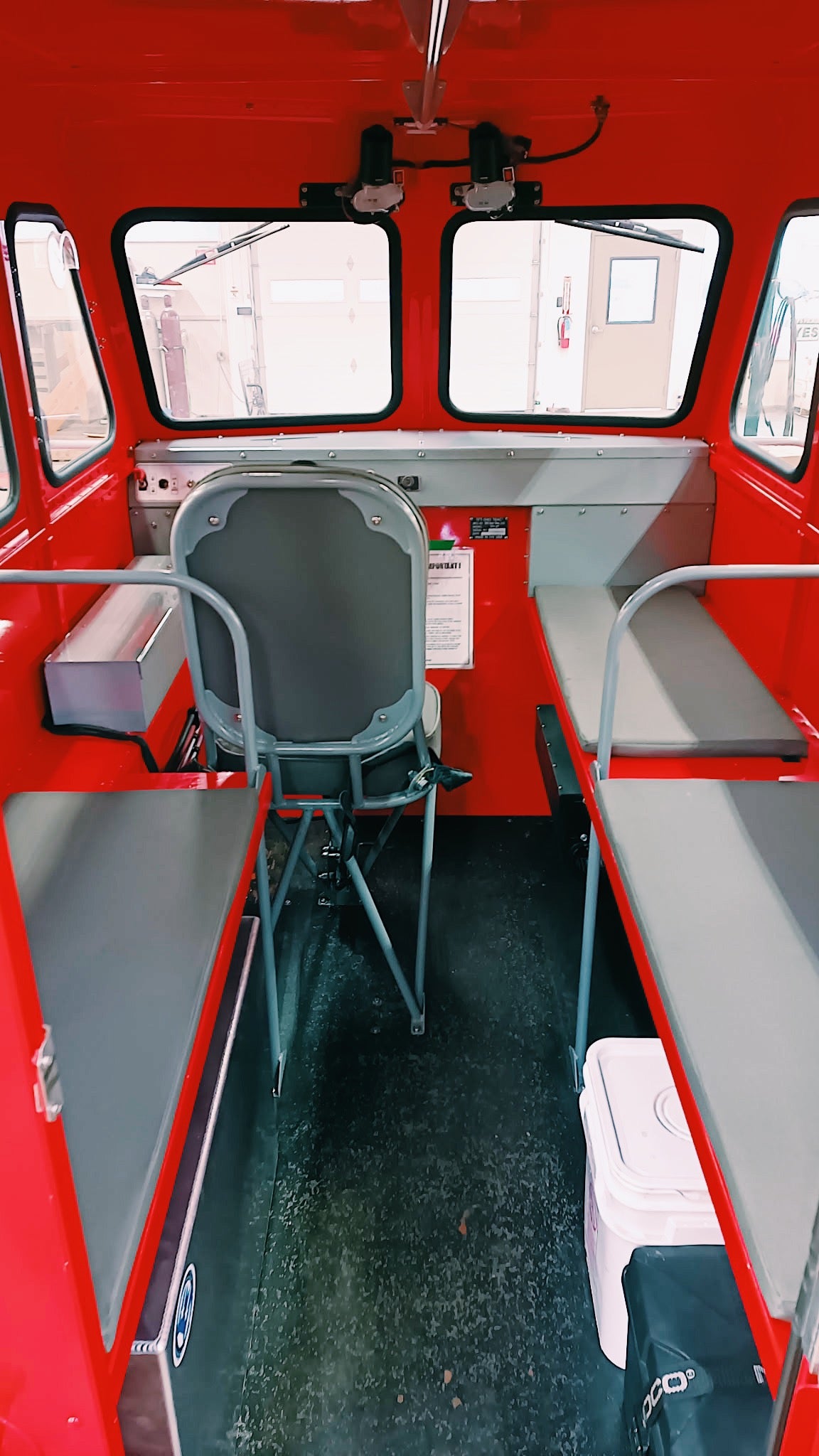 Red vehicle interior with gray seats