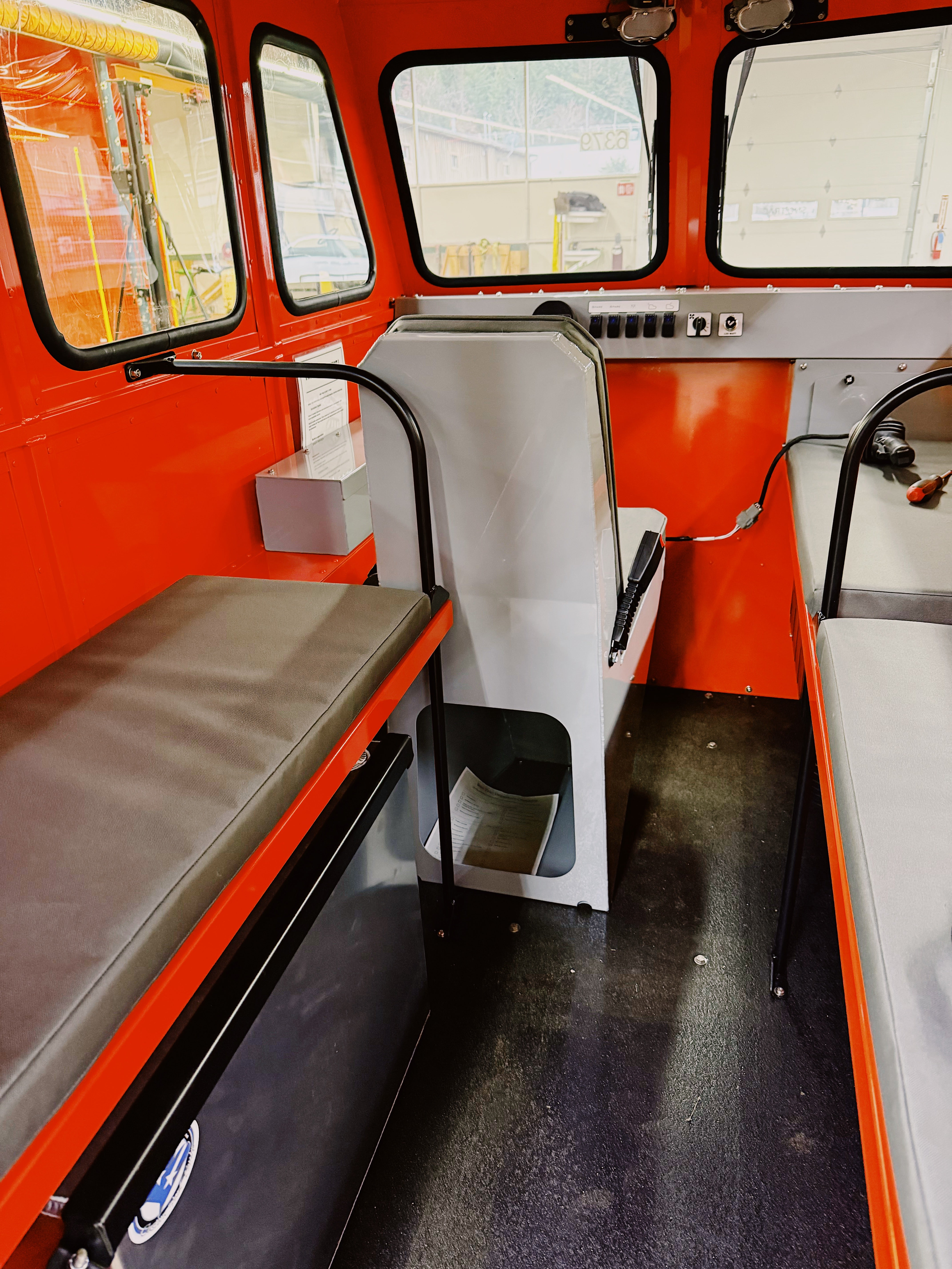 Sno Trac roomy interior with passenger bench seating