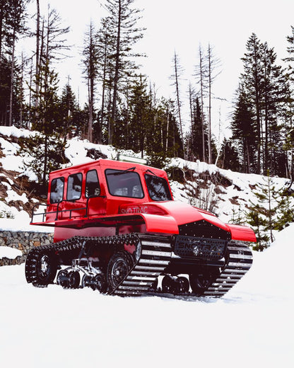 Red Sno Trac on snowy terrain